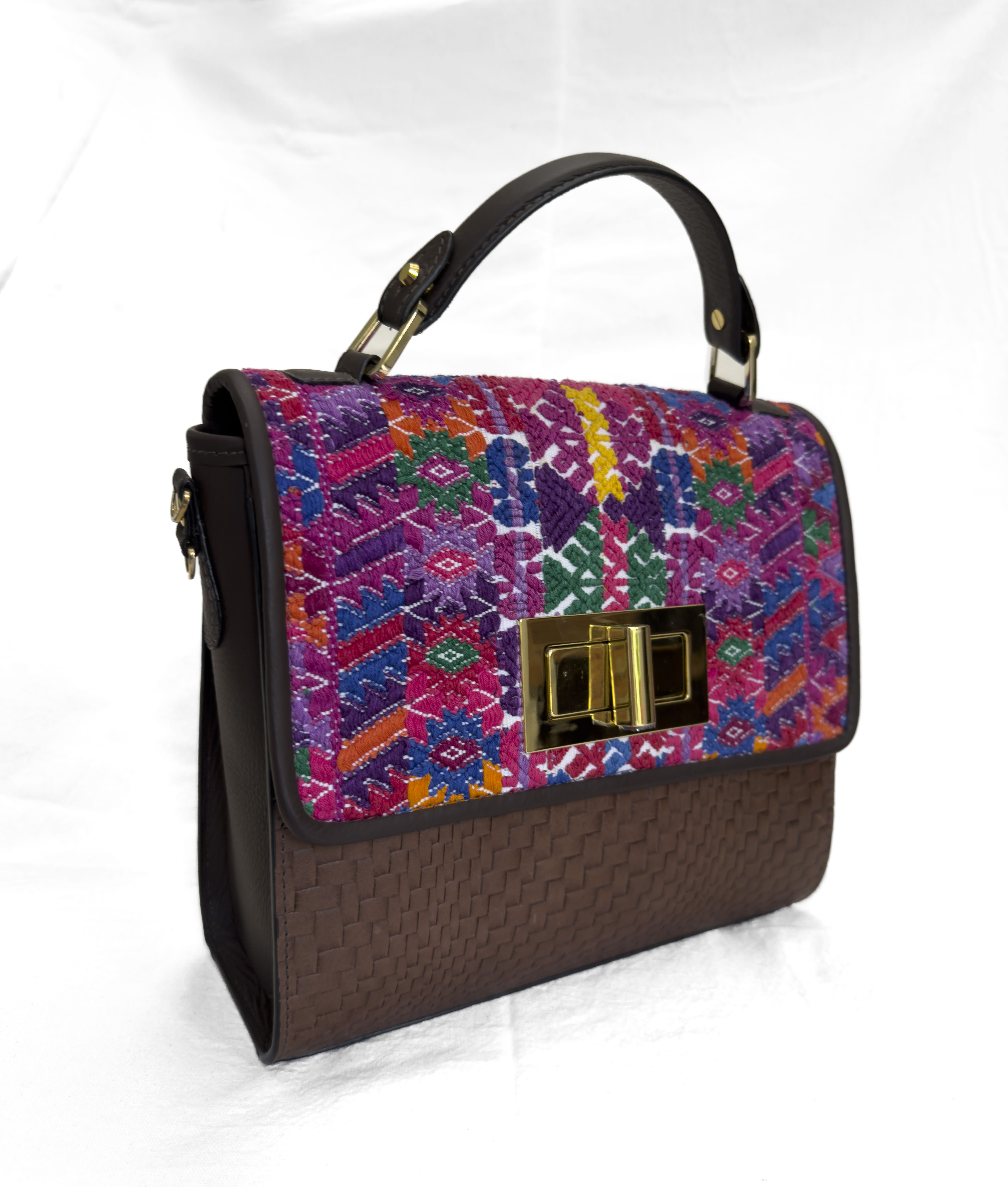 Embroidered satchel with a brown basket-weave finish and gold twist-lock